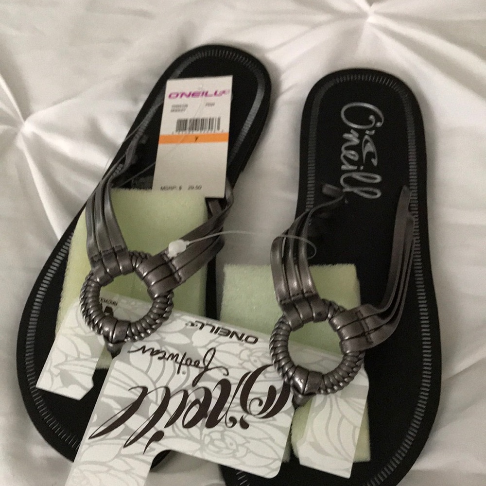 NWT pewter flip flops, size 7
